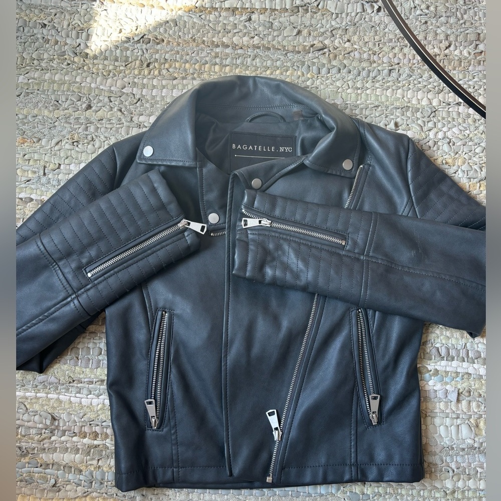 Black/grey leather jacket.
